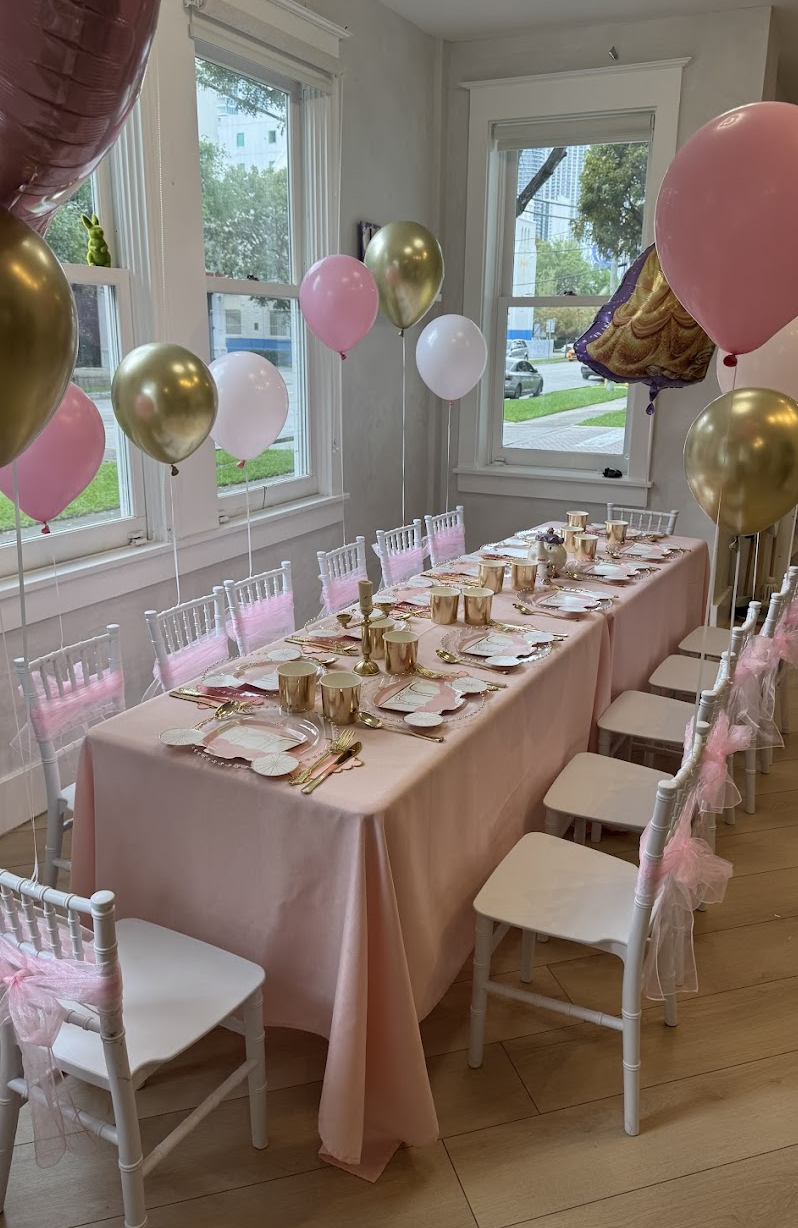 Pink and gold styled birthday table with balloons at LOULOU HOUSE