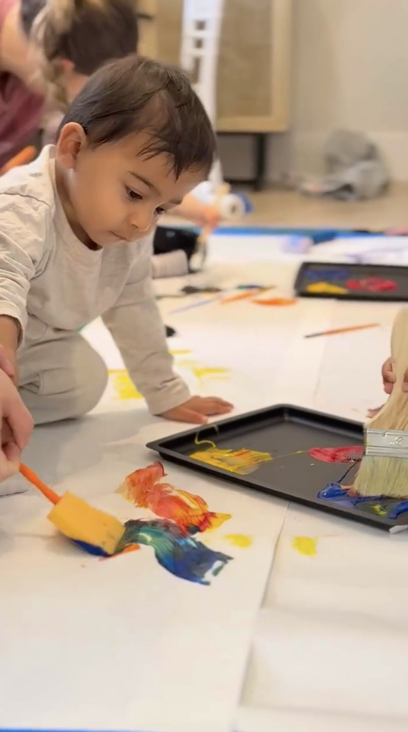 Focused little painter at a LOULOU HOUSE class