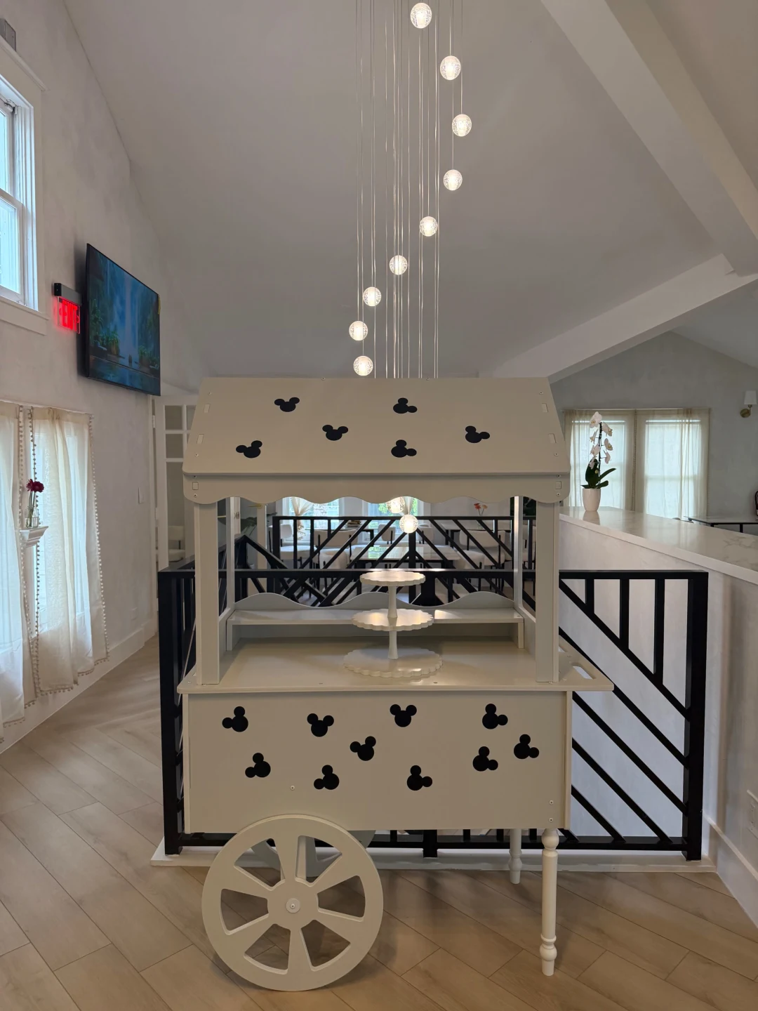 Mickey-themed sweet cart set up on the upstairs mezzanine