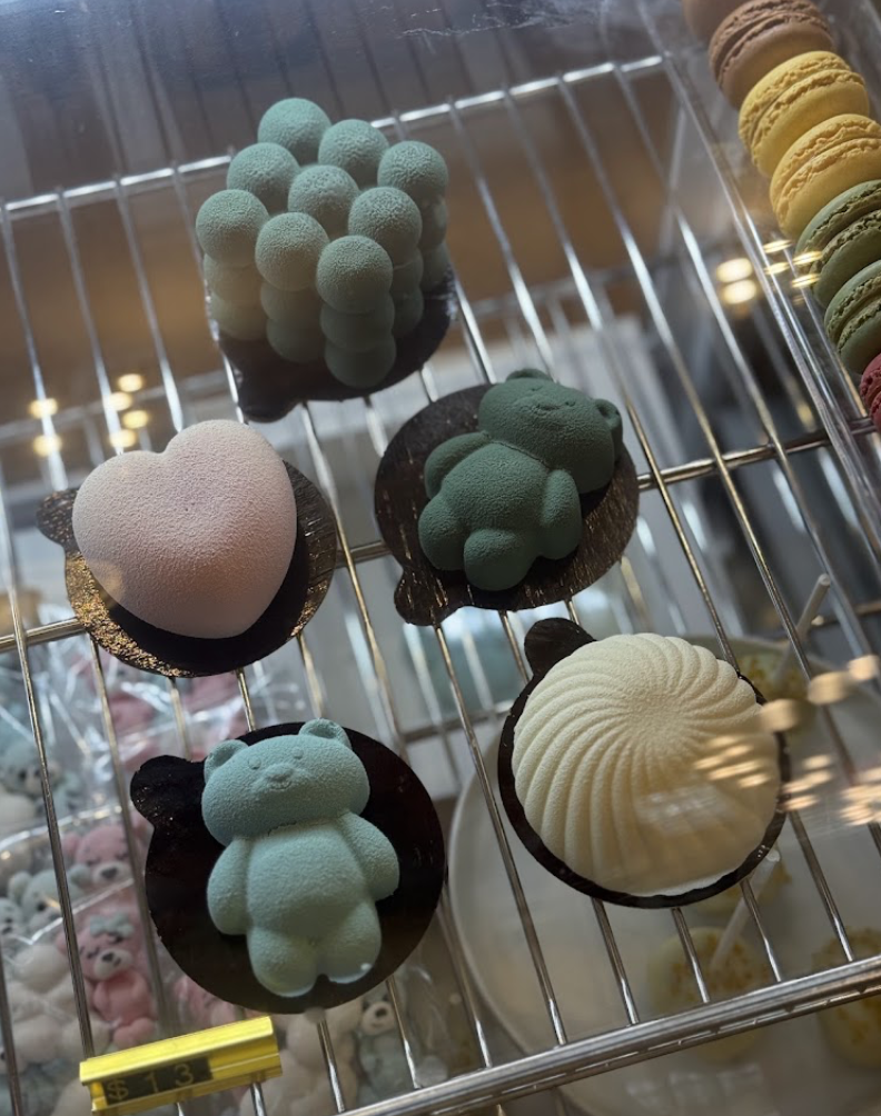 House-made mousse desserts and macarons in the pastry display